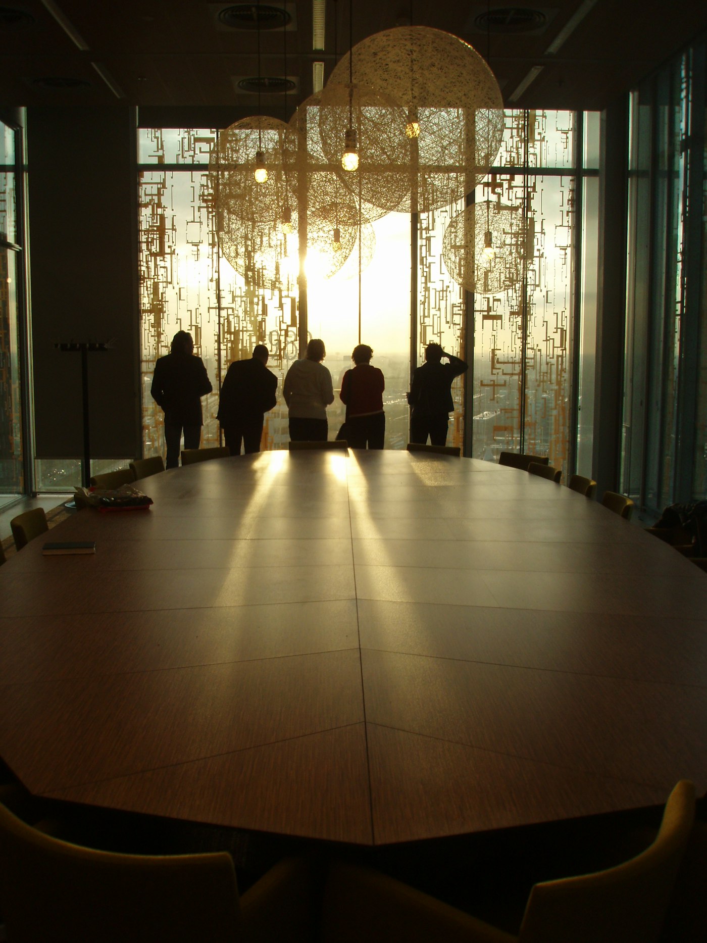 Leadership team in a sunlit boardroom