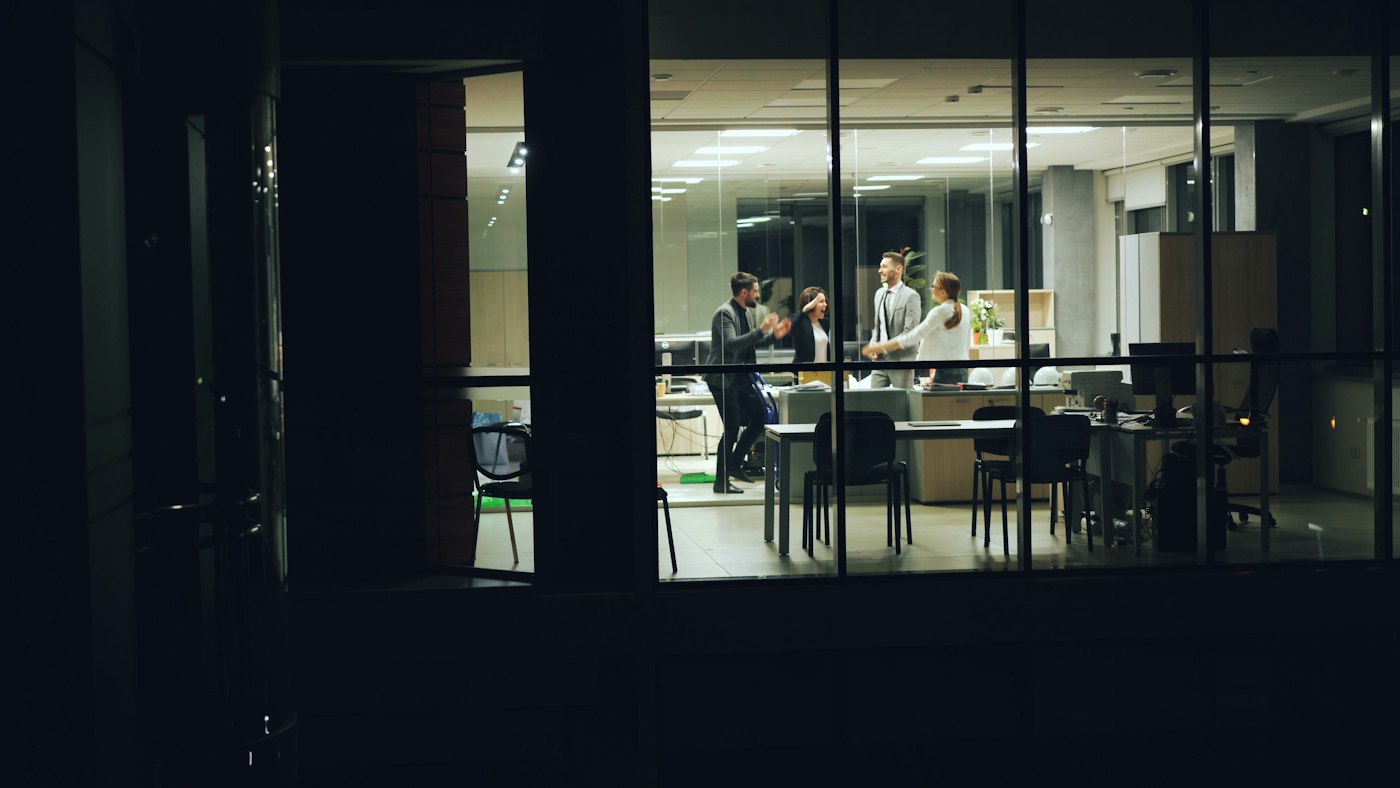 A team working late in a modern office